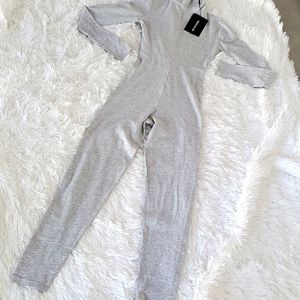 PRETTY LITTLE THING ROLL NECK JUMPSUIT 0